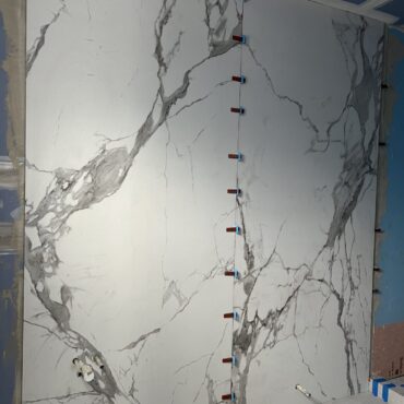 Large Format porcelain panel on bathroom wall